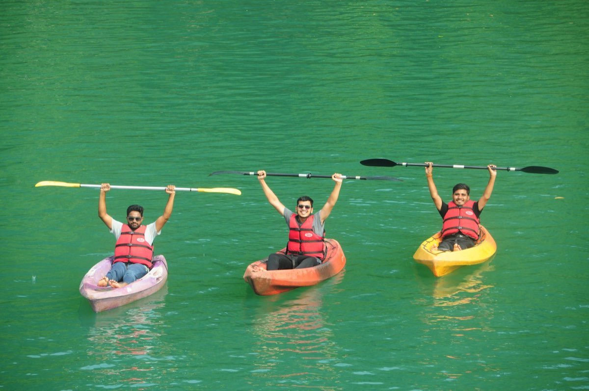 Guests kayaking on the river
