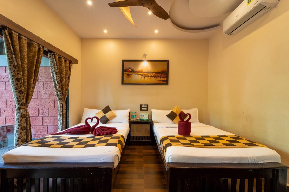 Premium AC room with twin beds at River Point