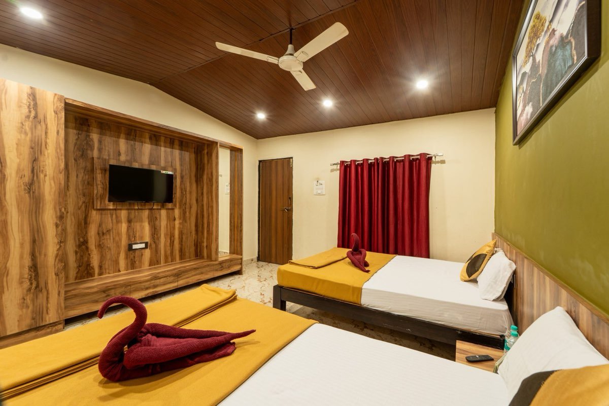 Standard AC room with twin beds at River Point